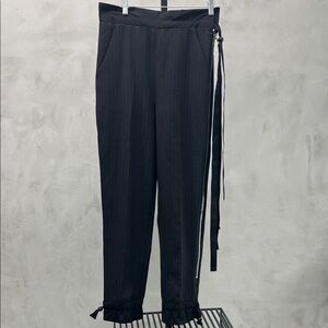 Denis Gagnon Striped Trousers with Side Tie and Zipped Leg